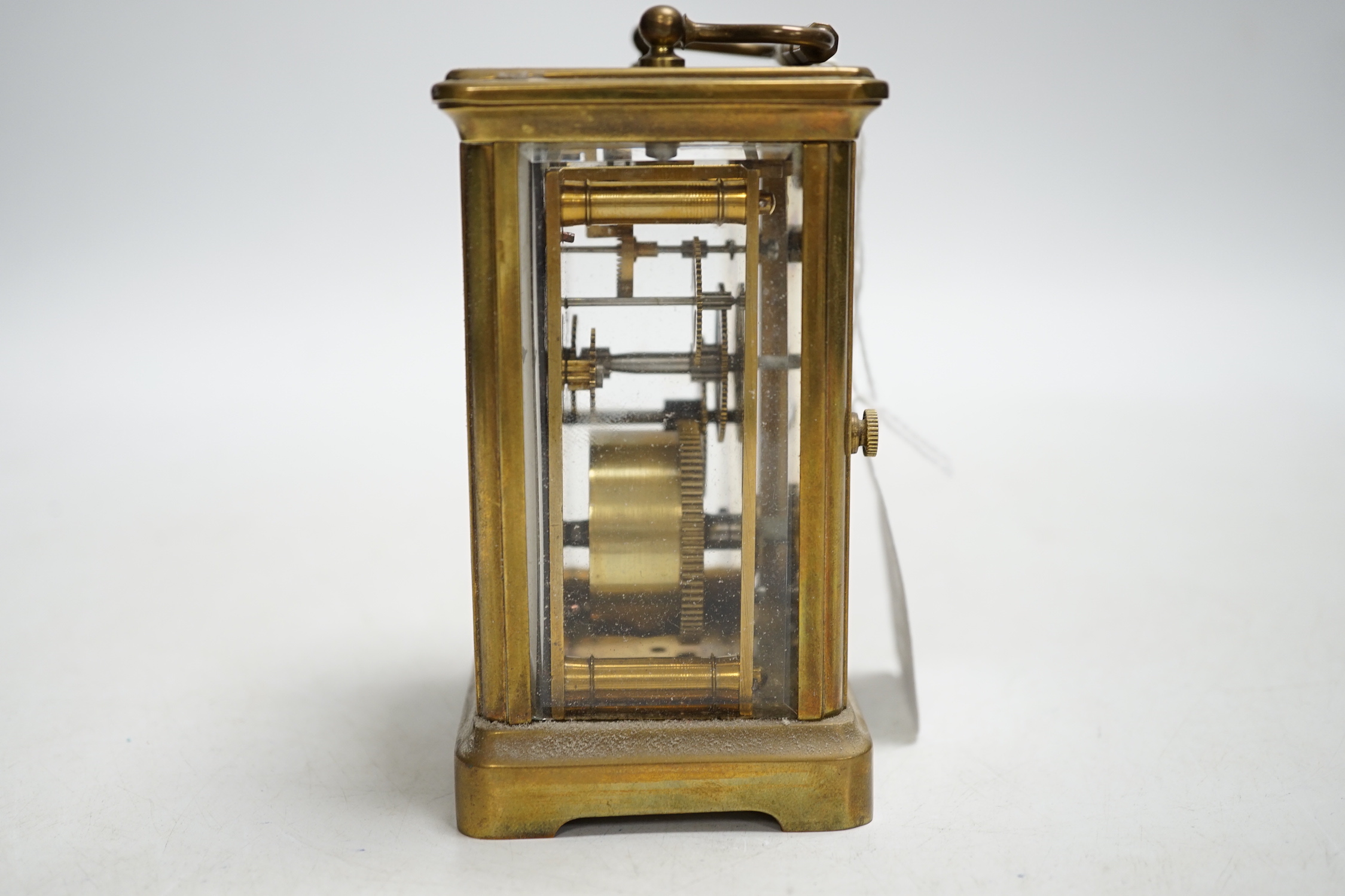 An early 20th century French lacquered brass carriage timepiece, cased, 11cm high